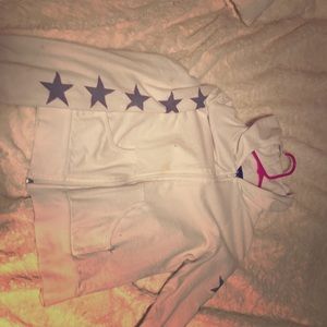 A zip up white jacket